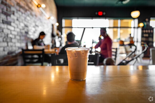 Get your daily caffeine at Aroma Coffee Shop by Delano Township.