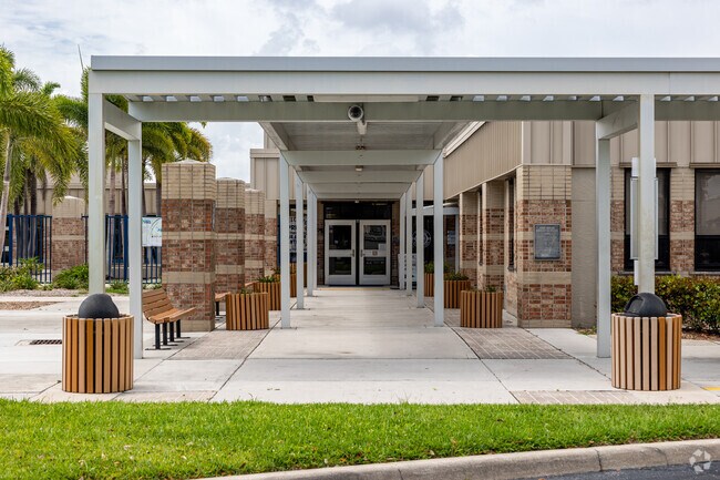 Pine Ridge Middle School in Naples has a covered front entrance for students.