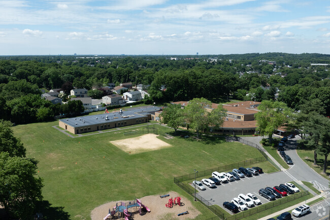 Village Elementary School in Syosset has a student enrollment of 433.