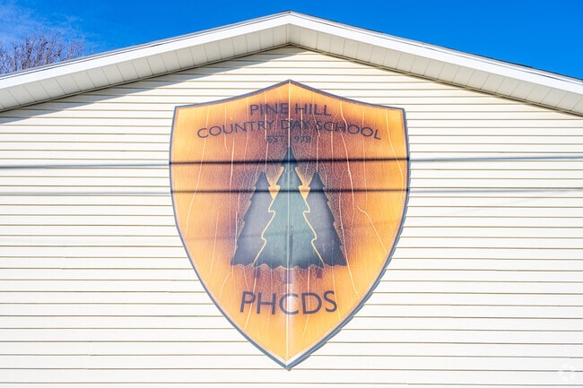 Here is the crest on the side of Fort Wayne's Pine Hill Country Day School.