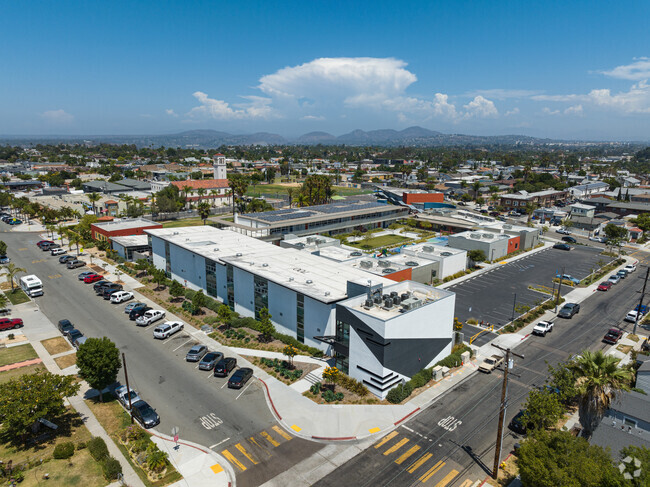 Main building with the vast amount of available parking.