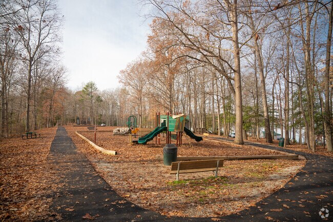 The playground at Sunday Park has gorgeous water-front views on both sides in Brandermill.