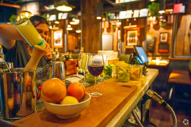 Enjoy a pour of red at Barcelona Wine Bar in Neighborhood Nine.