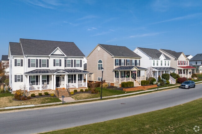 Stunning row of newly constructed colonial homes found in the Doubs area of Adamstown.