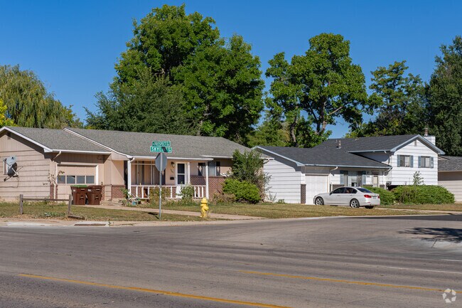 Mid-20th century ranch and split-level homes in Campus West have moderately sized yards.