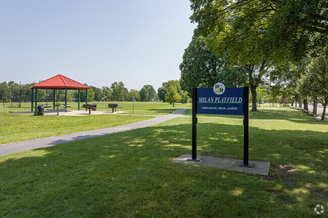 Shaded picnic areas with grills can be reserved at Milan Playfield in Evergreen.
