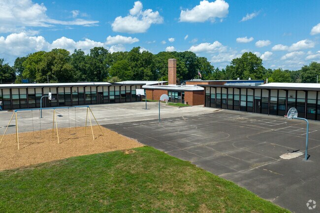 Cole Manor Elementary has basketball courts.