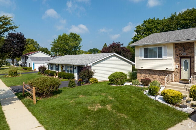 Housing styles in Edgelawn Randall range from split-level to classic ranch homes.