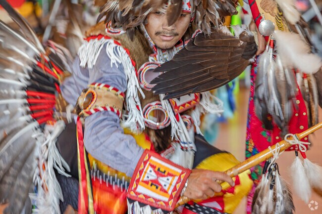Powerful headdress & dance are used during the Pow-Wow at Chief Seattle Days in Suquamish WA.