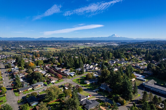 The West Hill North neighborhood stretches into the distance with Mt. Rainier visible.