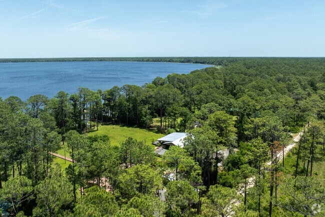 Ocean Pond has some areas with homes on the water well hidden by the large amounts of trees.
