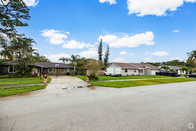 Quaint ranch-style residences dotting the tranquil Abbey Park neighborhood.
