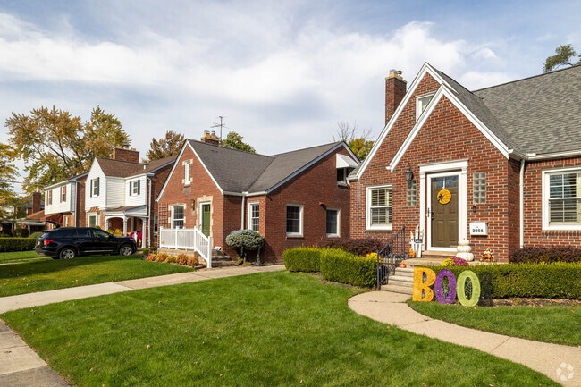 Sunny yards and classic brick homes can be found on many streets in Grosse Pointe Woods.