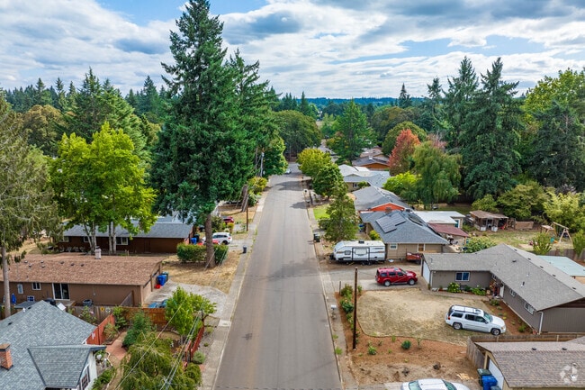 Quiet streets and tall fir trees help make the Faye Wright neighborhood a serene place.