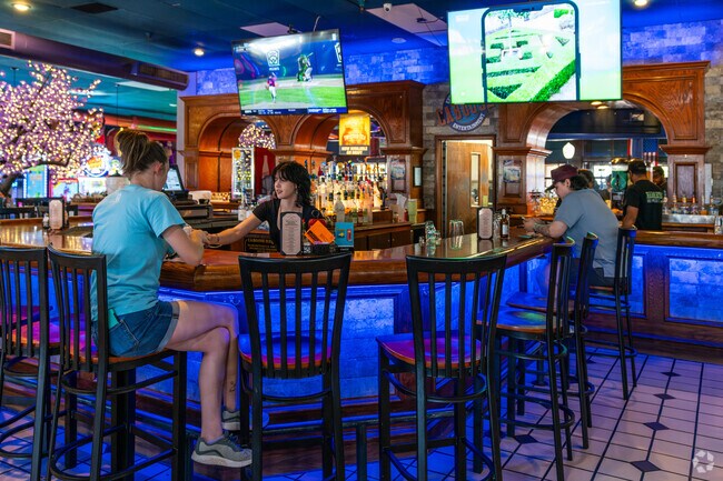 Guests at 50th Street Caboose can enjoy a drink at the bar while watching their favorite teams.