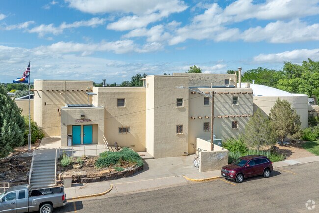 The Koshare Indian Museum in La Junta showcases stunning Native American art and beadwork beneath one of the nation’s largest self-supporting log roofs, blending tradition with striking architecture.