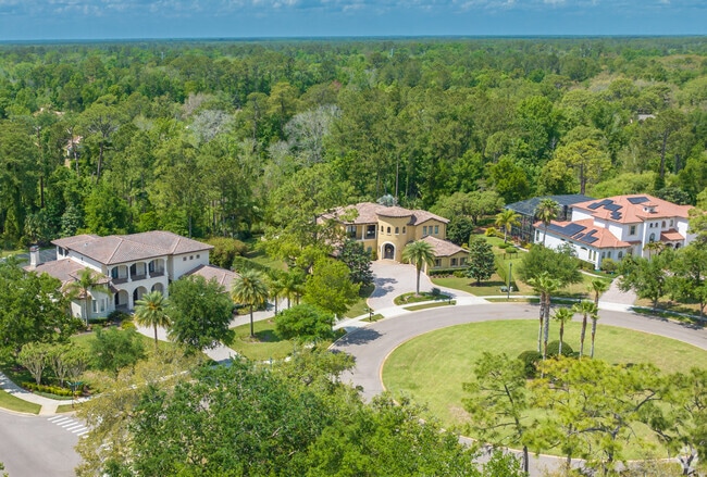 Alaqua features large private homes with gated access and lush landscapes.