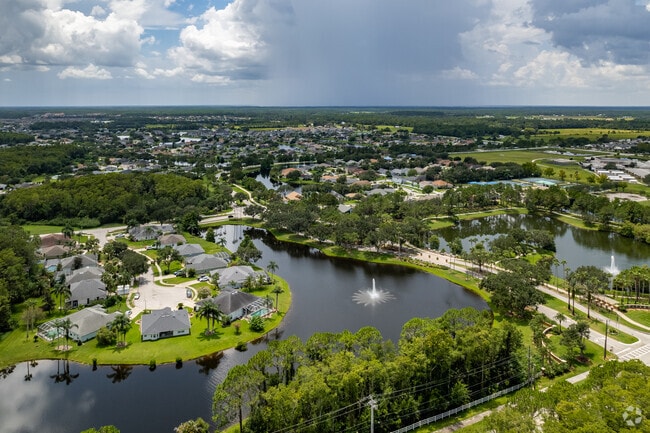 An aerial view of the entrance to the neighborhood Waters Edge in Port Orange.