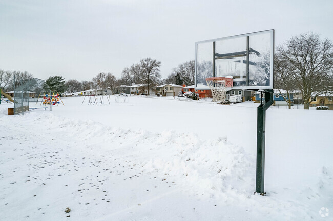 Neihardt Elementary School has a basketball hoop.