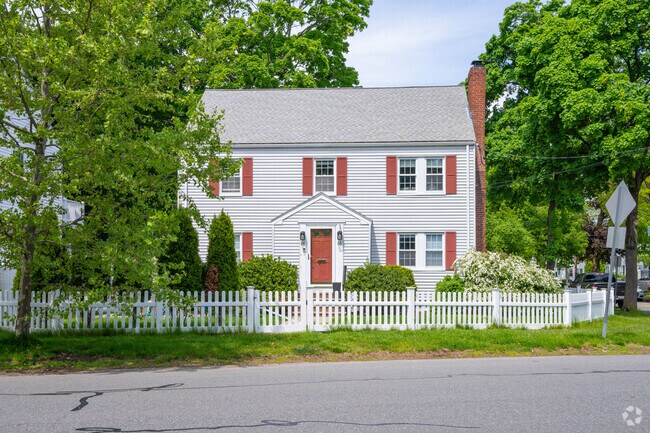 A white picket fence always compliments a home in Belmont Center.