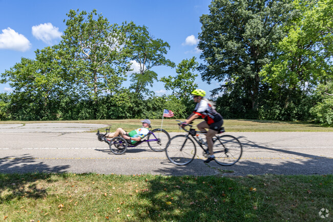 Bikers take advantage of the Great Miami River Trail to visit cities including West Carrollton.