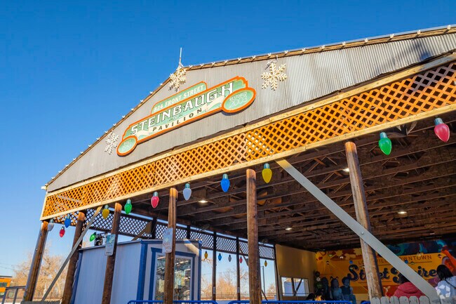 Steinbaugh Pavilion in Louisville, Colorado, is a vibrant community hub, hosting lively events and gatherings, where locals enjoy music, markets, and more in a welcoming open-air setting.
