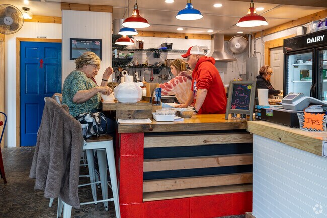 Situated in the heart of Elkview, The Husky Den, proudly embraces the local community spirit.