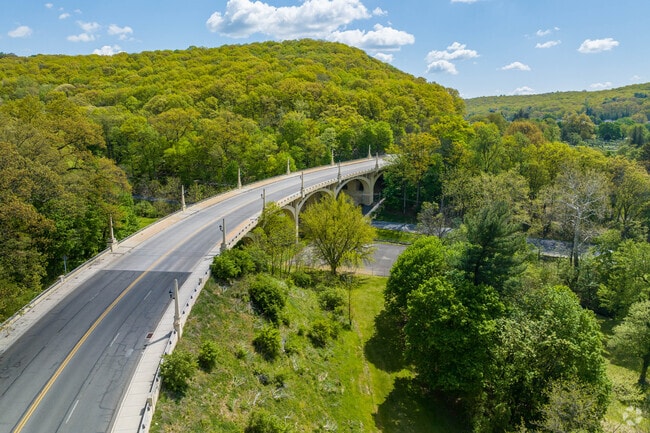 Drive across the Mineral Street Bridge to Mount Penn.