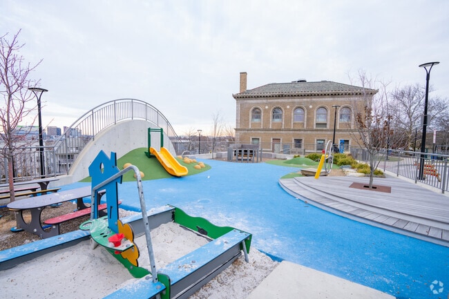 The play area next to Somerville High School has views of the Tobin Bridge in Sommerville, MA.