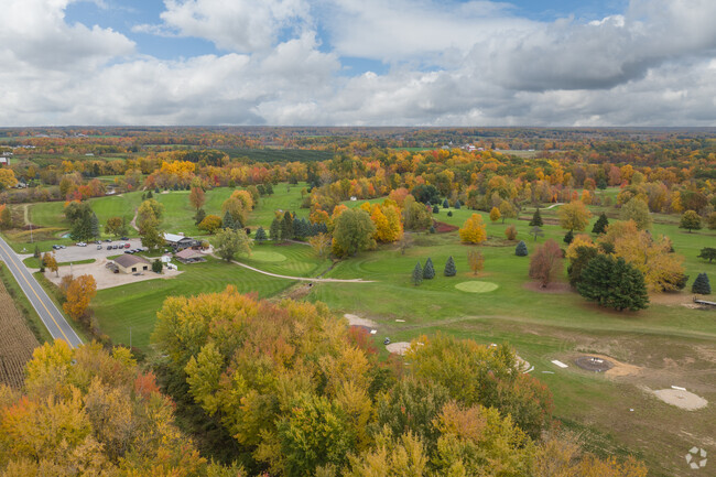 Arrowhead golf course in Vergennes Township has 18 holes stretching through lush woods.