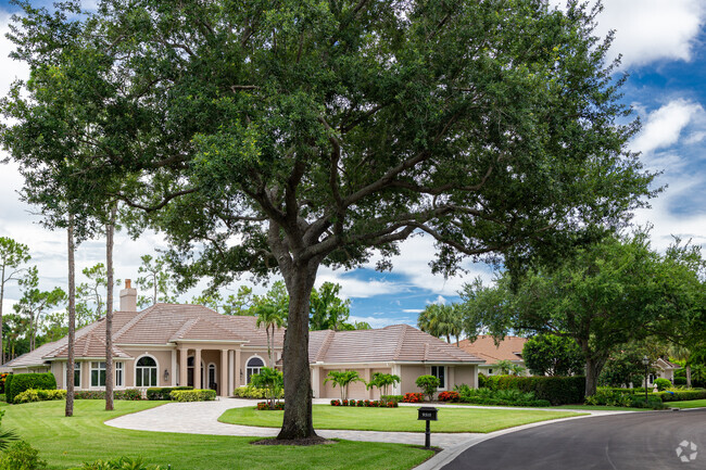 Homes in Grey Oaks are large and luxurious, with grand entrances and manicured lawns.