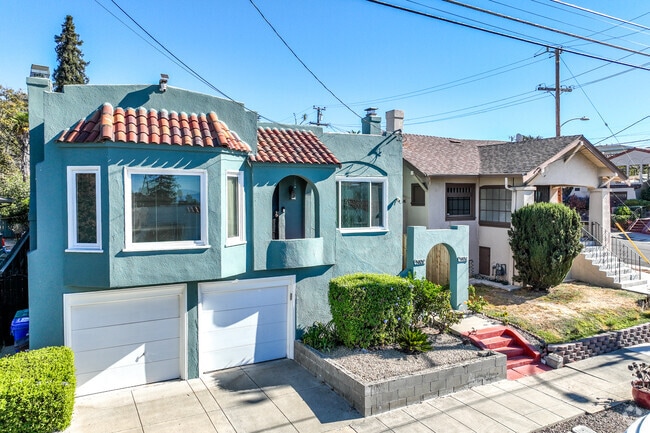 A row of beautiful single family homes in the Wentworth Holland neighborhood in Oakland.