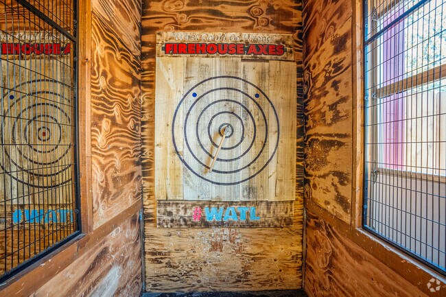 Practice Axe throwing at Firehouse Axes in the Lincoln neighborhood.