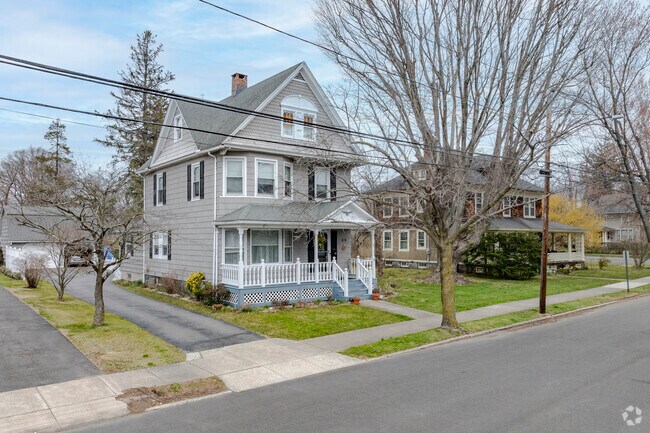 A traditional home in Stratford with a lovely porch.