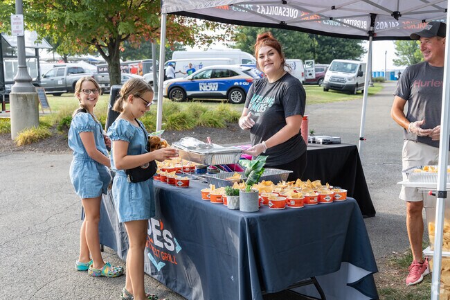 Food vendors line Liberty Park during 8 Great Tuesdays performances.