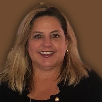 Anne Mills
