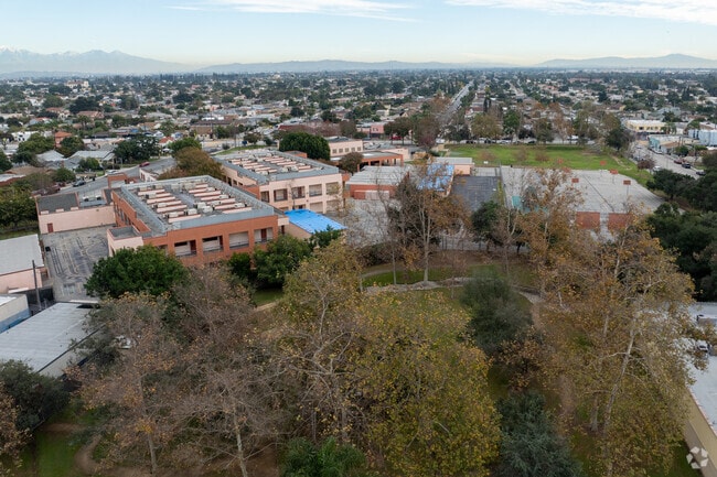 Walnut Park Elementary School surrounded by greenery.