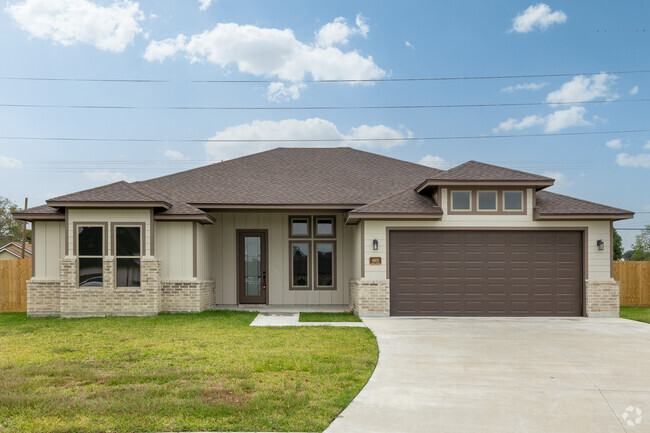 A new traditional ranch style home located in Groves.