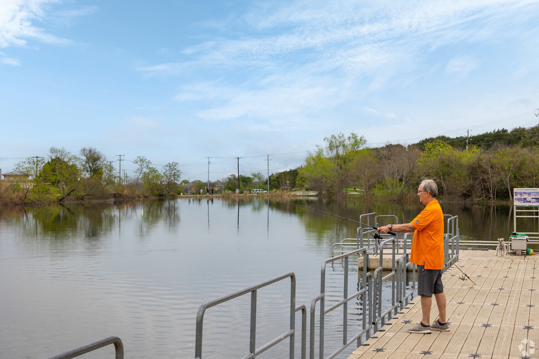 Locals can cast out a line at the pond of Fischer Park.