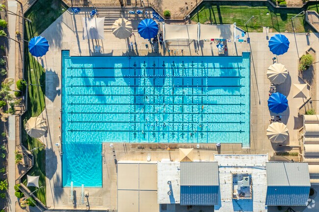 Dive into summer at the Arrowhead Pool, a favorite gathering place in Arrowhead Meadows.