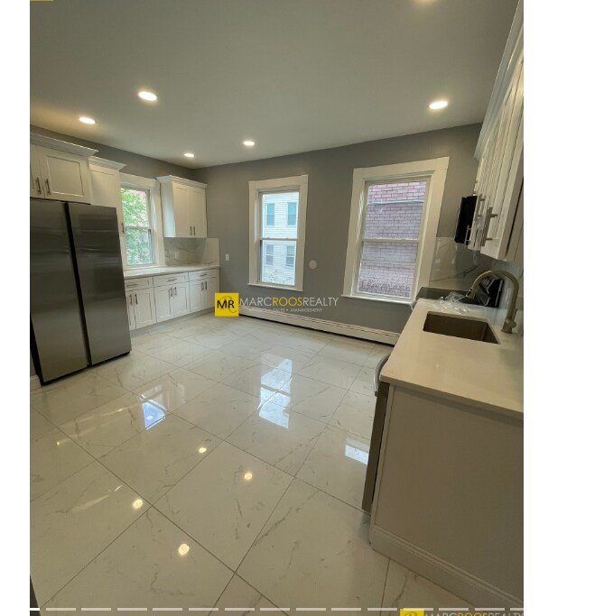 521 Green St unit 1, Cambridge, MA 02139 - photo 1