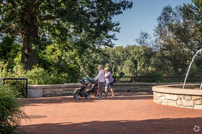 Families in Glastonbury Center enjoy nature and fresh air on scenic walking paths.