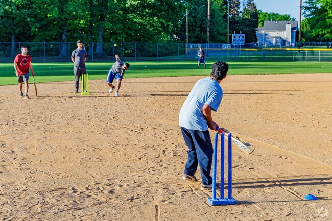 Bent Tree friends enjoy playing cricket at Deep River Recreation Center fields.