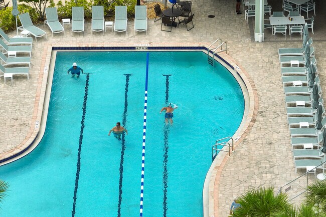 The resort-style swimming pool provides a space to relax in Fort Myers.
