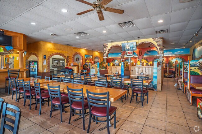 El Toro is a casual Mexican mainstay in a strip mall with folksy decor, familiar dishes & big margaritas.