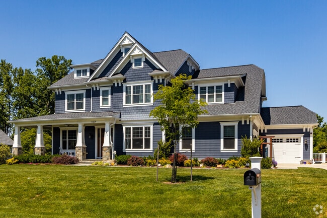 A massive craftsman style home nestled in North Bethesda's revered suburbs.