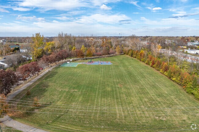 Further east is Cooper Park, which features playgrounds, a walking trail, and a basketball court.