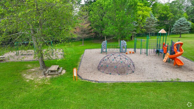 Students enjoy using playground equipment at The Village Charter School.