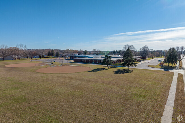 Armstrong Elementary has a large green space to the North