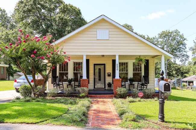This charming home in Eau Claire Columbia, SC is welcoming and neatly landscaped.